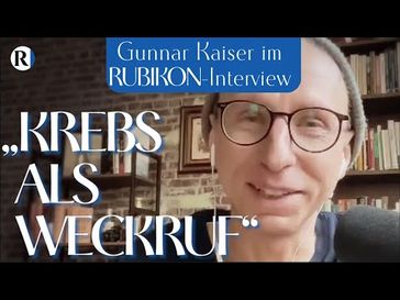 Bild: SS Video: "RUBIKON: Im Gespräch: „Krebs als Weckruf“ (Gunnar Kaiser und Jens Lehrich)" (https://youtu.be/9F8_510jY5s) / Eigenes Werk