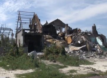 Zerstörtes Haus in der Oblast Donezk, Juli 2014