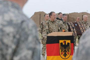 International Security Assistance Force Chief of Staff German Army Lt. Gen. Bruno Kasdorf, speaks before presenting the German Gold Cross of Honor medal to pilots and crew members of a U.S. air medevac unit, 5th Battalion, 158th Aviation Regiment, Katterbach, Germany, on May 12 at Provincial Reconstruction Team Kunduz. The German Gold Cross Medal, had never been awarded to foreign troops before. They were honored for their bravery evacuating wounded German Soldiers while under fire near Kunduz on April 2.(Photo by U.S. Army SFC Matthew Chlosta, ISAF PAO).