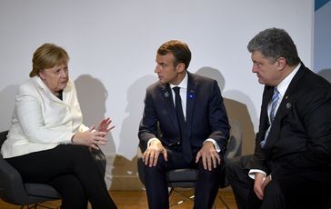 Angela Merkel, Emmanuel Macron et Petro Porochenko en 2018.
