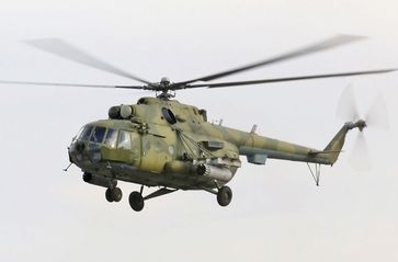 Militärvariante Mil Mi-8MT mit Auslegern und Bug-MG