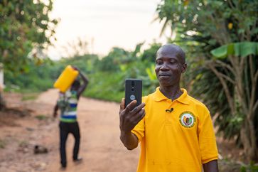 George Ansah, Kakaobauer der Fairtrade-Kooperative Fanteakwa in Ghana. Bild: Nipah Dennis / Fairpicture Fotograf: Nipah Dennis