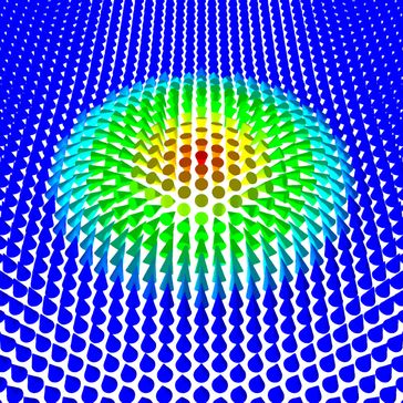 Abb. 1: Illustration eines magnetischen Skyrmions mit einem Durchmesser von nur wenigen Nanometern in einem atomar dünnen Kobaltfilm.
Quelle: S. Meyer, CAU Kiel (idw)