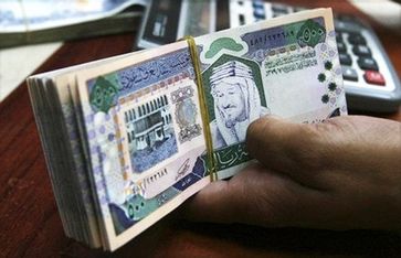 ائتمان bedeutet Kredit auf arabisch: Ausländisches Geld bedeutet ausländischen Einfluß (Symbolbild)