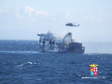 Norman Atlantic on fire, with rescue efforts underway. Photo from the Italian Navy.