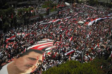 Pro-regime demonstration in Latakia, heartland of Assad's Alawite people