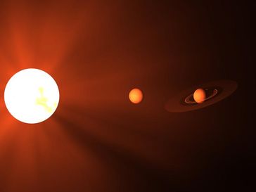 Künstlerische Darstellung eines massearmen Sterns und zweier Planeten.
Quelle: Grafik: Guillem Anglada-Escudé, University of London (idw)