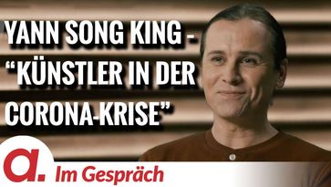 Bild: SS Video: "Im Gespräch: Yann Song King (“Wo waren die Künstler in der Corona-Krise?”)" (https://tube4.apolut.net/w/gJoMtVcwuwUw3ATGN8nQpK) / Eigenes Werk