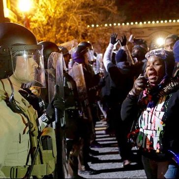 Proteste in Ferguson Bild:  Shafty Johnson, on Flickr CC BY-SA 2.0