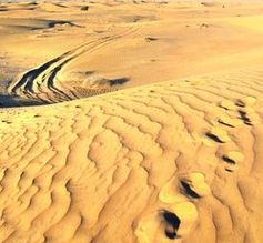 Wüste Sahara: Partikel werden aufgewirbelt. Bild: pixelio.de, M. Hermsdorf