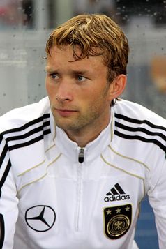 Rolfes with Germany in 2011