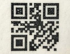 QR-Code: Tinte hinterlässt Punkte.