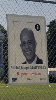 Wahlplakat von Michel Martelly Bild: Marcello Casal Jr / de.wikipedia.org