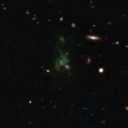 Der Lyman-Alpha-Klumpen leuchtet wegen der Rotverschiebung in Grün Bild: ESO/M. Hayes