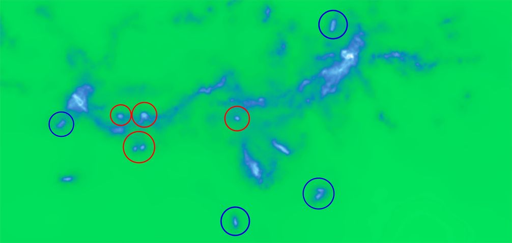 Die Abbildung zeigt einen kleinen Ausschnitt der Illustris-Simulation: Gezeiten-Zwerggalaxien (rot) enthalten im Gegensatz zu primordialen Zwerggalaxien (blau) keine Dunkle Materie.
Quelle: (c) Illustris-1-Simulation ( (idw)
