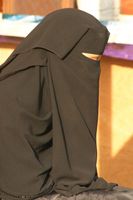 A woman wearing a niqāb. Under Saudi law, women are required to wear Hijab but niqab is optional.