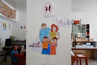 Drawings by young Syrian refugee girls in a community centre in southern Lebanon promote the prevention of child marriage.