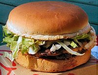 Ein Hamburger (auch kurz Burger) ist ein Weichbrötchen mit verschiedenen Belägen, das meistens als warmes Schnell- oder Fertiggericht verkauft wird.