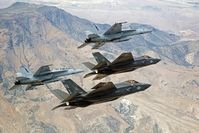 F-35C Lightning IIs, attached to the Grim Reapers of Strike Fighter Squadron (VFA) 101, and an F/A-18E/F Super Hornets attached to the Naval Aviation Warfighter Development Center (NAWDC)