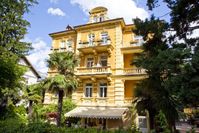Traumhafter Blick auf das von Palmen umgebene Hotel Westend *** in Meran, Italien  Bild: Hotel Westend *** Fotograf: Hotel Westend ***