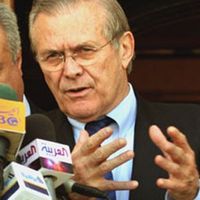 Rumsfeld speaks during a press conference in the Green Zone in Baghdad, April 12, 2005