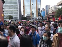 Leute mit Mundschutz in Taiwan, wegen des Coronavirus