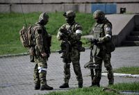 Auf dem Bild: Angehörige der Nationalgarde Russlands im Gebiet Cherson, 19. April 2022. Bild: Sputnik
