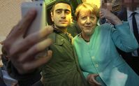 Angela Merkel steht wegen Ihrer Einladung von Flüchtlingen aus aller Welt in der Dauerkritik in Deutschland (2017), Archivbild