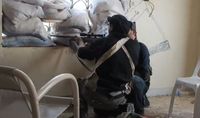 A Syrian rebel sniper in Khan al-Asal, Aleppo Governorate.
