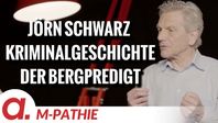 Bild: SS Video: "M-PATHIE – Zu Gast heute: Jörn Schwarz “Kriminalgeschichte der Bergpredigt”" (https://tube4.apolut.net/w/s4rrCgYXaDxJWscDWPkrUK) / Eigenes Werk