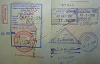 Verschiedene Sichtvermerke (Visa) und andere Kontrollstempel in einem deutschen Reisepass