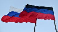 Flaggen der Volksrepublik Donezk und der Russischen Föderation Bild: Pawel Lissizyn / Sputnik
