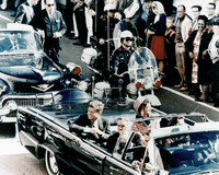 President Kennedy with his wife, Jacqueline, and Governor of Texas John Connally in the presidential limousine, minutes before the President's assassination