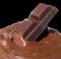 Feste und flüssige Schokolade (Symbolbild)