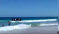 Bild: Screenshot Youtube Video "Illegal Migrants Spill Onto Spanish Beach, August 2017"