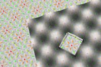 Die winzigen Wirbel aus nur je etwa 15 Atomen bilden ein regelmäßiges nahezu quadratisches Gitter. Die Grafik zeigt im rechten Bereich die magnetische Messung mithilfe spinpolarisierter Rastertunnelmikroskopie als Graustufenbild. Das herausgeschnittene Quadrat markiert ein einzelnes Skyrmion. Die farbigen Kegel zeigen die Orientierung der magnetischen Ausrichtung der einzelnen hexagonal angeordneten Eisenatome des Metallfilms an. Bild: M. Menzel, Universität Hamburg