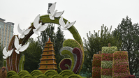 A file photo of a floral display themed "a community with a shared future for mankind" in Beijing, China. Bild: VCG
