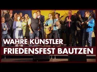 Bild: SS Video: "Wahre Künstler: Friedensfest Bautzen" (https://youtu.be/-rv_wC91Xsg) / Eigenes Werk