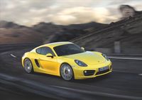 Porsche feiert auf der Los Angeles Auto Show 2012 die Weltpremiere des neuen Cayman. Bild: "obs/Porsche AG"