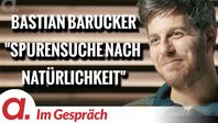 Bild: SS Video: "Im Gespräch: Bastian Barucker (“Auf Spurensuche nach Natürlichkeit”)" (https://tube4.apolut.net/w/hPjAyGXbc2Rv2N86RPiEXe) / Eigenes Werk
