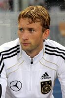 Rolfes with Germany in 2011