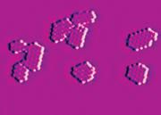 Hybridhalbleiter mit neuen elektronischen Eigenschaften: Rastertunnelmikroskop-Bild des IUB-Modellsystems der organischen PTCDA-Molekülgruppen auf der metallischen Ag(111)-Trägersubstanz
