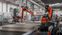 Zwei Roboterzellen montieren OSB- und Gipskartonplatten vollautomatisch auf das Riegelwerk Bild: WeberHaus GmbH & Co. KG Fotograf: WeberHaus GmbH & Co. KG