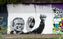 Christian Streich  als Graffito an der Dreisam, in der Nähe der Schwabentorbrücke, gemalt von Andreas Herre und Julian Mielke; anlässlich des Klassenerhalts